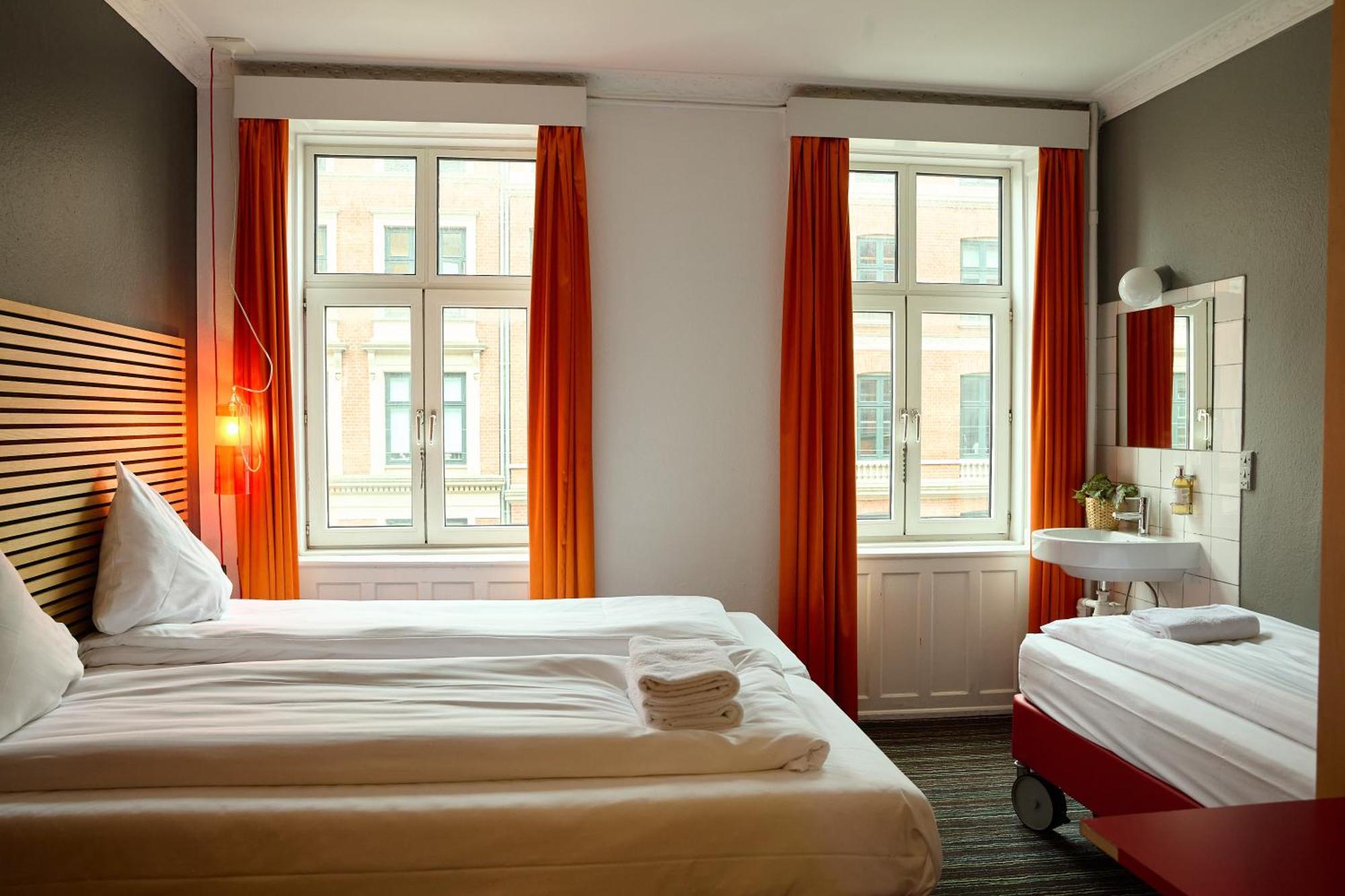 Dreibettzimmer mit Gemeinschaftsbad